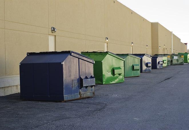 industrial garbage dumpsters filled with discarded materials in Golden Valley