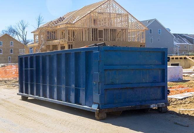 a residential dumpster in a suburban neighborhood ready for trash collection